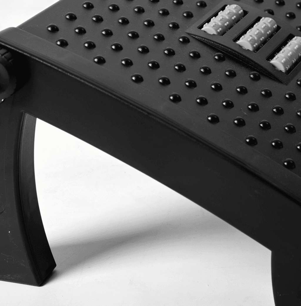 Reposapies regulable con masajeador